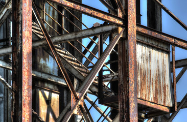 Abandoned rusted industrial structures in old port