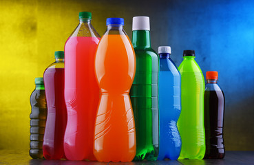 Plastic bottles of assorted carbonated soft drinks
