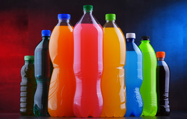 Plastic bottles of assorted carbonated soft drinks
