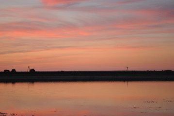 Fototapeta premium Red sunset over the reservoir Siemianowka, Poland