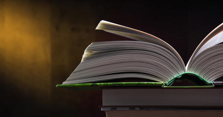 Composition with open book on the table