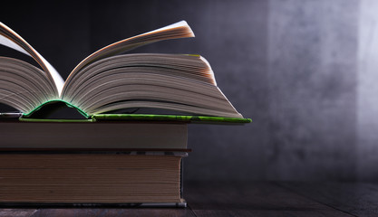 Composition with open book on the table