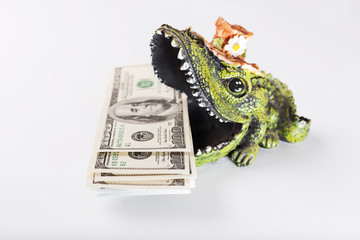 Money in crocodile's mouth, american dollars, USD