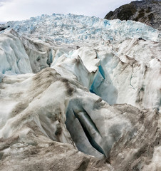 Franz Josef Glacier crampons hike through the blue glacier ice - New Zealand, South Island, NZ