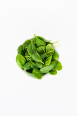 Fresh green leaves spinach isolated on a white background. Healthy and detox concept.