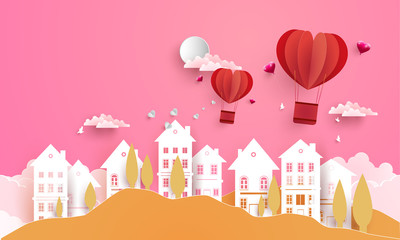illustrations of love and valentine's day with paper art design. air balloon across the housing.