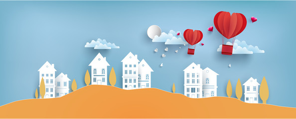 illustrations of love and valentine's day with paper art design. air balloon across the housing. © Framework Wonderland