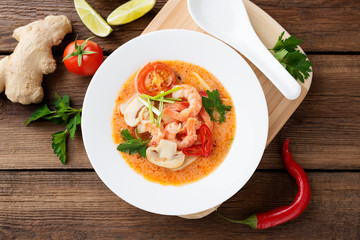 Thai food soup Tom Yam with Coconut milk, Chili pepper and Seafood.