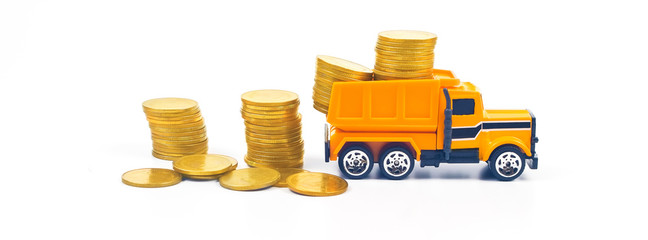 Truck car carry a golden coin stack on white background.