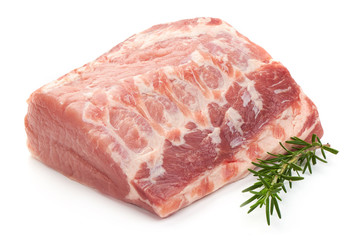 Raw pork neck meat with rosemary, isolated on white background. Close-up.