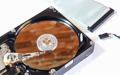 Hard disk drive inside. Data safety concept.