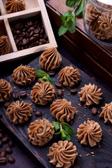 Coffee creamy fudge on a dark wooden board