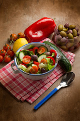 mixed salad with green olives capsicum cucumber and tomatoes