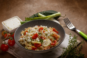 mixed salad with quinoa feta cheese cucumber and tomatoes