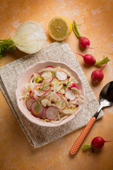 mixed salad with fennel radish lemon and pink pepper