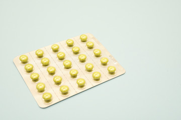 Closed up medicine tablet in aluminum blister pack