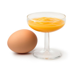 Glass with traditional dutch egg liqueur and an egg