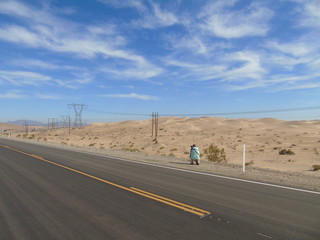Photographer taking pictures in the desert