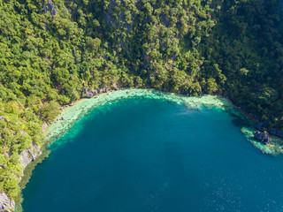 Aerial view to tropical Twin lagoon with azure water, Coron island. Palawan, Philippines.