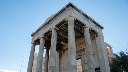 Naklejka premium The Erechtheion an ancient Greek temple on the north side of the Acropolis of Athens, Attica, Greece