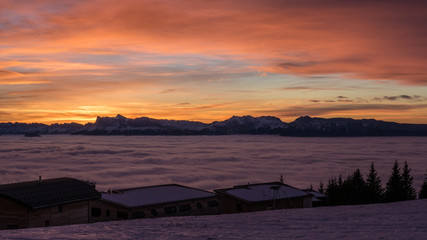 Sunset over sea of clouds in Chamrousse