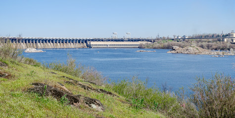 Fototapeta na wymiar View of the dam (Dneproges) from the island of Khortytsya in the city of Zaporozhye (Ukraine)