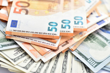 Dollars and euros macro. Good profits. Money bills.