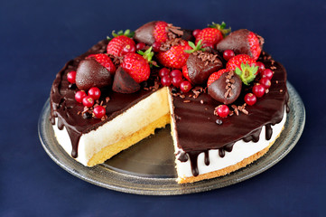 Chocolate strawberry cake with a missing piece