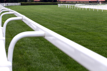 Empty racing track racecourse without horses and riders