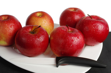Red apples on white. Close-up
