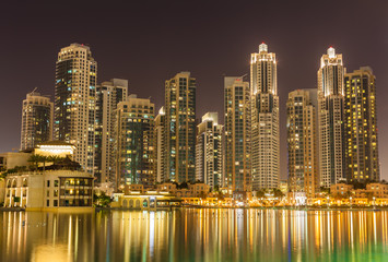 Fototapeta na wymiar Wonderful Dubai skyscrapers and fountain at night