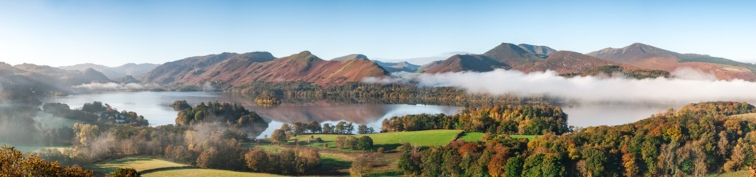 A panorama of Derwent Water, Lake District in Autumn colours with cloud inversion