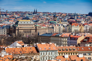 Naklejka na ściany i meble National Theatre building and Prague city old town seen from Petrin hill in a beautiful early spring day