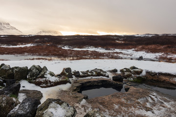 Landbrotalaug Hot Pot: Hidden in Snaefellsnes, Iceland. Photographed during sunset in winter. 