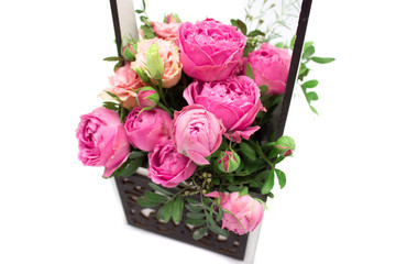 Bouquet of flowers in a box, Booker of roses for mother's day. Rose in a gift box. Flowers on March 8. Happy women's day. Bouquet for a birthday.