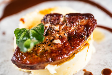 Mashed potato with meat and sauce