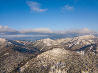 Snowy forest on the mountain slopes of Slovakia. Aerial view 