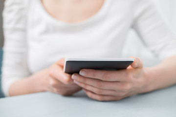 Woman reading an e-book.