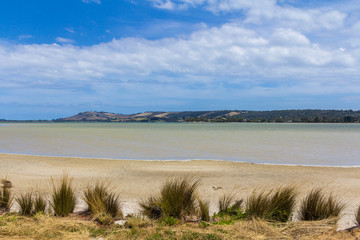 sunny shallow water bay in Tasmania Australia
