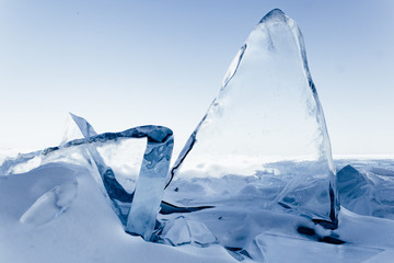 Blocks of ice gleaming in the sun. Arctic winter background.