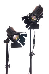 Floodlight with halogen lamp and Fresnel lens. Lighting equipment for shooting. Filming and photographing in the interior.
