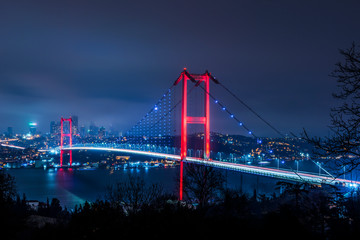 Istanbul Bosphorus Bridge at night. 15th July Martyrs Bridge (15 Temmuz Sehitler Koprusu). Istanbul, Turkey..