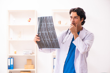 Young male doctor radiologist working at the clinic