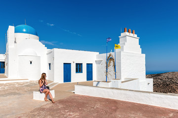 Young woman enjoying holidays in Greece. Sifnos island, Cyclades, Greece