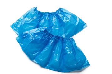 Obraz premium Two medical blue shoe covers overshoes isolated on white background. Catalog top view