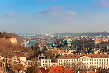 Fototapeta premium Rooftops and bridges of Prague, Czech Republic viewed from the Prague Castle.
