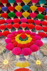 Fototapeta na wymiar Incense colourful sticks in Hue market, Vietnam