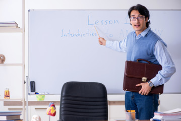 Young lecturer teacher teaching anatomy
