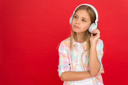 Enjoy music concept. Music always with me. Little girl listen song headphones. Online radio station channel. Leisure concept. Girl child listen music modern headphones. Get music account subscription