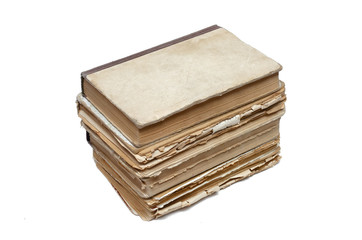 Stack of aged books isolated on a white background.